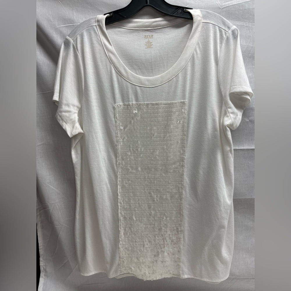 White longer length ladies T-shirts with white sequins panel.